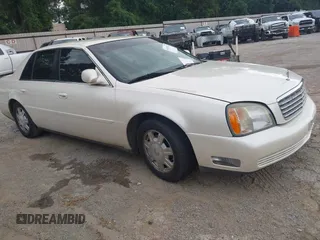 2002 Cadillac DeVille z VIN 1G6KD54Y92U130111, wystawiony jako IAAI lot #42439252 z przebiegiem 194 669 mil mil oraz . Historia ofert i sprzedaży dostępna na DreamBid. Obrazek 1.