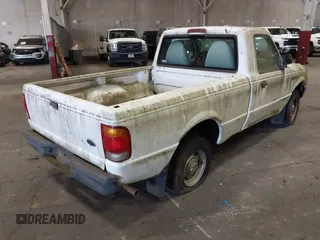 1999 Ford Ranger XL with VIN 1FTYR10C2XPB58611, listed as a IAAI auction lot 42475655 with 117,372 mi miles and . Bid and sale history available at DreamBid. Image 4.