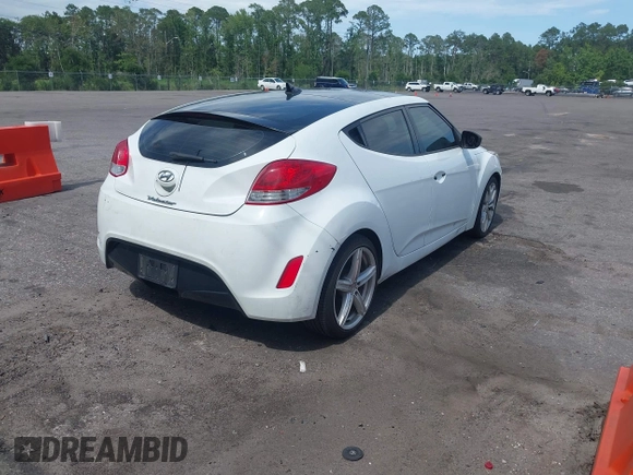 2012 Hyundai Veloster w/Gray Int z VIN KMHTC6ADXCU050034, wystawiony jako IAAI lot #42506584 z przebiegiem 142 514 mil mil oraz . Historia ofert i sprzedaży dostępna na DreamBid. Obrazek 4.