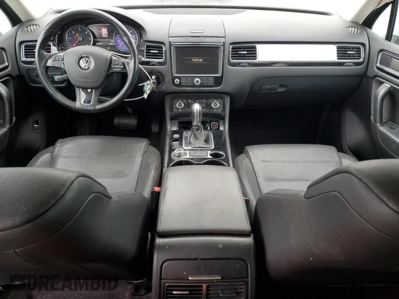 2015 Volkswagen Touareg Lux с VIN WVGEP9BP2FD002247, выставлен на аукционе Copart как лот 41924615 с пробегом 127 543 миль миль и Списание • Salvage title. История ставок и продаж доступна на DreamBid. Изображение 8.