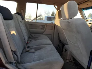 2001 Isuzu Trooper S with VIN JACDJ58X817J17877, listed as a Copart auction lot 41788875 with 203,199 mi miles and Salvage title. Bid and sale history available at DreamBid. Image 11.