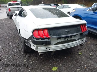 2018 Ford Mustang EcoBoost z VIN 1FA6P8TH2J5184938, wystawiony jako IAAI lot #42359873 z przebiegiem 80 965 mil mil oraz . Historia ofert i sprzedaży dostępna na DreamBid. Obrazek 20.
