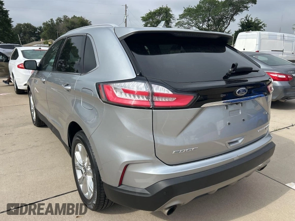 2020 Ford Edge Titanium z VIN 2FMPK3K95LBA30633, wystawiony jako IAAI lot #42473515 z przebiegiem 104 190 mil mil oraz . Historia ofert i sprzedaży dostępna na DreamBid. Obrazek 10.