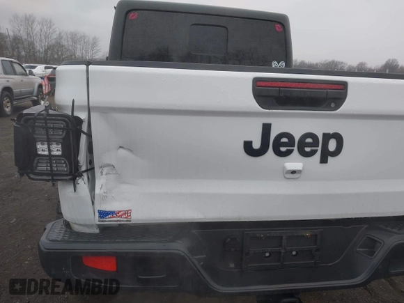 2020 Jeep Gladiator Sport S z VIN 1C6HJTAG0LL129461, wystawiony jako IAAI lot #41464713 z przebiegiem 66 625 mil mil oraz . Historia ofert i sprzedaży dostępna na DreamBid. Obrazek 17.