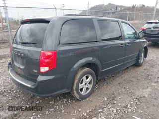 2012 Dodge Grand Caravan SXT with VIN 2C4RDGCG8CR242235, listed as a IAAI auction lot 41922083 with 124,306 mi miles and . Bid and sale history available at DreamBid. Image 4.