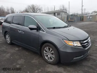 2016 Honda Odyssey SE with VIN 5FNRL5H3XGB150025, listed as a IAAI auction lot 41857704 with 69,515 mi miles. Bid and sale history available at carsss.com. Image 1.