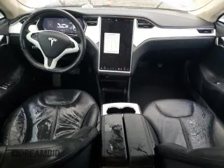 2014 Tesla Model S 60 z VIN 5YJSA1H10EFP55828, wystawiony jako Copart lot #56135145 z przebiegiem 161 317 mil mil oraz Czysty tytuł • Clean title. Historia ofert i sprzedaży dostępna na DreamBid. Obrazek 8.