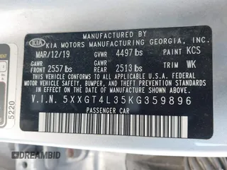 2019 Kia Optima LX with VIN 5XXGT4L35KG359896, listed as a IAAI auction lot 41849243 with 140,975 mi miles. Bid and sale history available at carsss.com. Image 9.