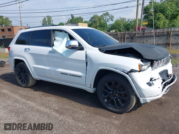 2017 Jeep Grand Cherokee Overland with VIN 1C4RJFCT6HC880306, listed as a IAAI auction lot 42534987 with 97,976 mi miles and . Bid and sale history available at DreamBid. Image 1.