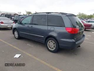 2009 Toyota Sienna XLE with VIN 5TDBK22C19S027059, listed as a IAAI auction lot 42105532 with 241,532 mi miles. Bid and sale history available at carsss.com. Image 3.