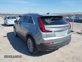 2023 Cadillac XT4 AWD Luxury with VIN 1GYFZBR40PF148068, listed as a IAAI auction lot 41583045 with 35,229 mi miles. Bid and sale history available at carsss.com. Image 3.