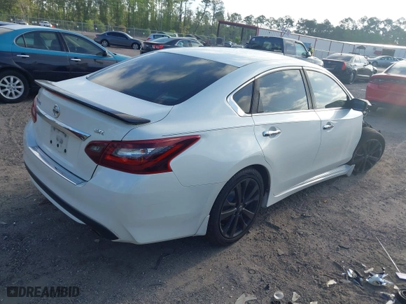2017 Nissan Altima 2.5 SR with VIN 1N4AL3AP4HC231332, listed as a IAAI auction lot 41966946 with 151,015 mi miles. Bid and sale history available at carsss.com. Image 4.
