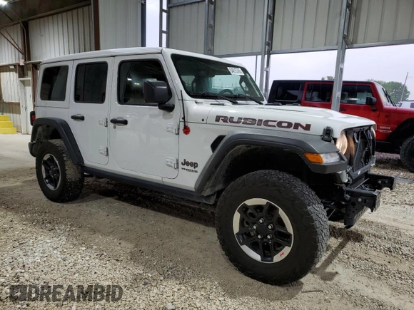 2022 Jeep Wrangler Unlimited Rubicon with VIN 1C4HJXFN8NW129717, listed as a Copart auction lot 54615745 with 33,544 mi miles and Salvage title. Bid and sale history available at DreamBid. Image 4.
