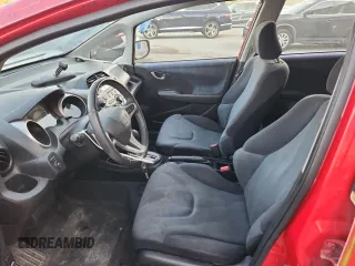 2009 Honda Fit Sport z VIN JHMGE88479S055924, wystawiony jako Copart lot #67186495 z przebiegiem 65 984 mil mil oraz Szkoda całkowita • Salvage title. Historia ofert i sprzedaży dostępna na DreamBid. Obrazek 7.