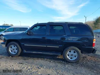 2005 Chevrolet Tahoe LS with VIN 1GNEK13T75J126912, listed as a IAAI auction lot 41370116 with 242,937 mi miles. Bid and sale history available at carsss.com. Image 14.