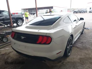 2019 Ford Mustang EcoBoost z VIN 1FA6P8TH1K5168795, wystawiony jako IAAI lot #42105634 z przebiegiem 61 480 mil mil oraz . Historia ofert i sprzedaży dostępna na DreamBid. Obrazek 4.