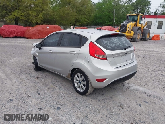 2013 Ford Fiesta SE with VIN 3FADP4EJ6DM107293, listed as a IAAI auction lot 41898229 with 129,694 mi miles. Bid and sale history available at carsss.com. Image 3.