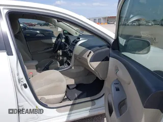 2013 Toyota Corolla L with VIN 5YFBU4EE1DP090957, listed as a IAAI auction lot 41898057 with 127,438 mi miles and . Bid and sale history available at DreamBid. Image 5.