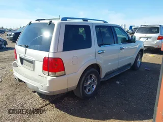 2003 Lincoln Aviator Luxury z VIN 5LMEU68H43ZJ34736, wystawiony jako IAAI lot #41220366 z przebiegiem Nie podano mil oraz . Historia ofert i sprzedaży dostępna na DreamBid. Obrazek 4.
