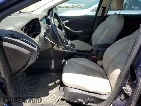 2016 Ford Focus Titanium z VIN 1FADP3J2XGL319399, wystawiony jako Copart lot #59258745 z przebiegiem 215 296 mil mil oraz Szkoda całkowita • Salvage title. Historia ofert i sprzedaży dostępna na DreamBid. Obrazek 7.