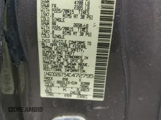 2004 Nissan Frontier XE with VIN 1N6DD26T54C472795, listed as a Copart auction lot 57382115 with 200,903 mi miles and Salvage title. Bid and sale history available at DreamBid. Image 12.