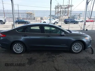 2015 Ford Fusion SE Hybrid with VIN 3FA6P0LU6FR309099, listed as a IAAI auction lot 42497429 with 157,631 mi miles and . Bid and sale history available at DreamBid. Image 13.