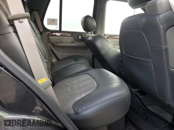 2004 GMC Envoy SLT z VIN 1GKDT13S042406662, wystawiony jako Copart lot #50523855 z przebiegiem 62 122 mil mil oraz Czysty tytuł • Clean title. Historia ofert i sprzedaży dostępna na DreamBid. Obrazek 11.