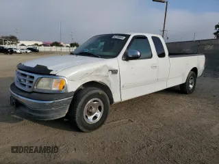 1999 Ford F-150 XL with VIN 1FTRX17L6XNA06844, listed as a Copart auction lot 83109004 with Not Provided miles and Salvage Title. Bid and sale history available at carsss.com. Image 1.