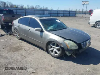2004 Nissan Maxima SE with VIN 1N4BA41E24C849127, listed as a IAAI auction lot 41768809 with 150,567 mi miles. Bid and sale history available at carsss.com. Image 1.