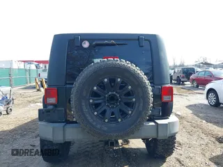2008 Jeep Wrangler Unlimited Rubicon with VIN 1J8GA691X8L641959, listed as a IAAI auction lot 41586564 with 174,886 mi miles and . Bid and sale history available at DreamBid. Image 16.
