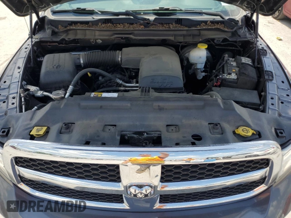 2021 Ram 1500 SLT with VIN 1C6RR7LG1MS549786, listed as a Copart auction lot 54871635 with 77,801 mi miles and Salvage title. Bid and sale history available at DreamBid. Image 11.