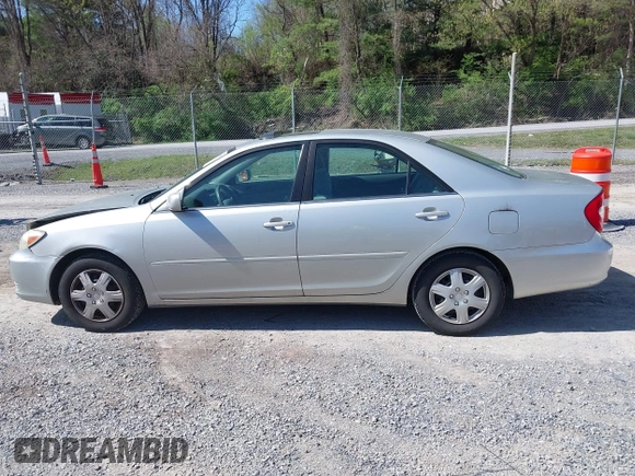 2004 Toyota Camry LE with VIN 4T1BE30K14U290983, listed as a IAAI auction lot 41983078 with 174,852 mi miles and . Bid and sale history available at carsss.com. Image 14.