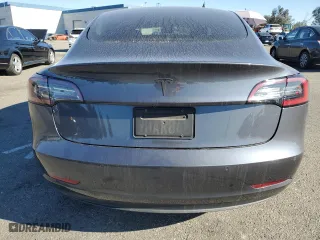 2021 Tesla Model 3 Standard Range Plus with VIN 5YJ3E1EA9MF872920, listed as a Copart auction lot 83625474 with 62,507 mi miles and Salvage Title. Bid and sale history available at carsss.com. Image 6.
