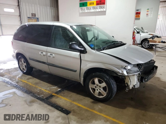 2005 Dodge Caravan SXT with VIN 1D4GP45RX5B165500, listed as a Copart auction lot 59680105 with 119,096 mi miles and Salvage title. Bid and sale history available at DreamBid. Image 4.