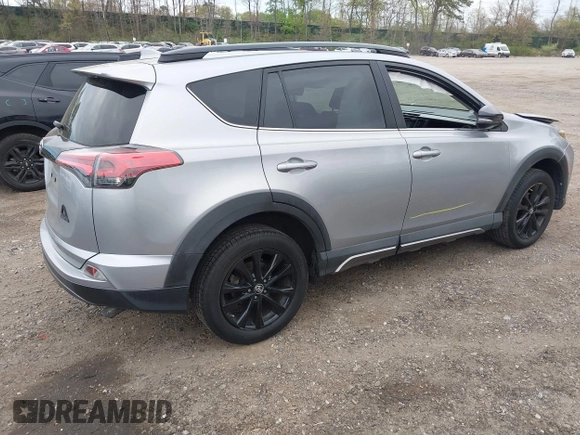 2018 Toyota RAV4 XLE with VIN 2T3RFREV1JW718474, listed as a IAAI auction lot 42144572 with 62,852 mi miles and . Bid and sale history available at DreamBid. Image 4.