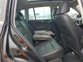 2015 Volkswagen Tiguan SE z VIN WVGBV7AXXFW606017, wystawiony jako Copart lot #51005745 z przebiegiem Nie podano mil oraz Szkoda całkowita • Salvage title. Historia ofert i sprzedaży dostępna na DreamBid. Obrazek 10.