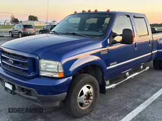 2003 Ford F-350 XL with VIN 1FTWW33P23EC02154, listed as a Copart auction lot 63713235 with 260,340 mi miles and Clean title. Bid and sale history available at DreamBid. Image 2.