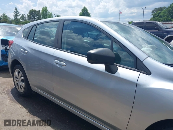 2020 Subaru Impreza with VIN 4S3GTAB66L3733864, listed as a IAAI auction lot 42135432 with 50,719 mi miles and . Bid and sale history available at DreamBid. Image 14.