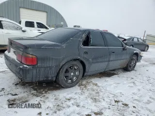 2002 Cadillac Seville Touring STS z VIN 1G6KY549X2U177791, wystawiony jako Copart lot #89313345 z przebiegiem 171 707 mil mil oraz Szkoda całkowita • Salvage title. Historia ofert i sprzedaży dostępna na DreamBid. Obrazek 3.