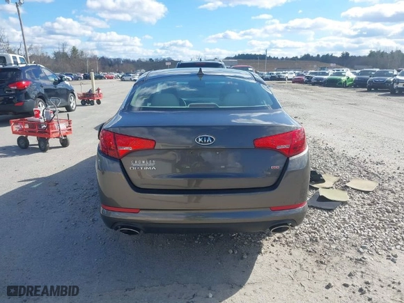 2012 Kia Optima LX with VIN 5XXGM4A72CG083861, listed as a IAAI auction lot 41909434 with 124,526 mi miles. Bid and sale history available at carsss.com. Image 16.
