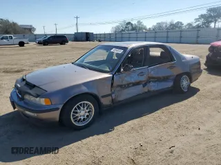 1992 Acura Legend L with VIN JH4KA7660NC007660, listed as a Copart auction lot 46936035 with 173,848 mi miles and Salvage Title. Bid and sale history available at DreamBid. Image 1.
