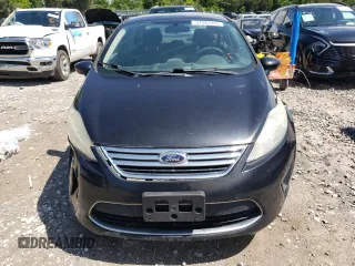 2012 Ford Fiesta SE z VIN 3FADP4BJ5CM195837, wystawiony jako Copart lot #57363165 z przebiegiem 108 003 mil mil oraz Szkoda całkowita • Salvage title. Historia ofert i sprzedaży dostępna na DreamBid. Obrazek 5.