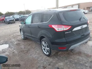 2014 Ford Escape Titanium with VIN 1FMCU9J95EUA96397, listed as a IAAI auction lot 41089757 with 107,494 mi miles. Bid and sale history available at carsss.com. Image 3.