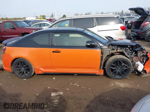 2015 Scion tC with VIN JTKJF5C7XFJ008076, listed as a IAAI auction lot 40856462 with 155,117 mi miles. Bid and sale history available at carsss.com. Image 14.