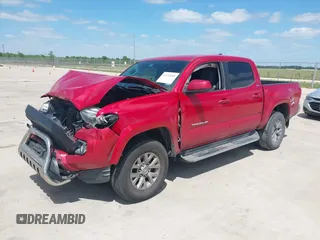 2016 Toyota Tacoma SR5 with VIN 5TFAX5GN2GX059826, listed as a IAAI auction lot 42032005 with 209,271 mi miles. Bid and sale history available at carsss.com. Image 17.