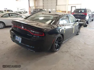 2016 Dodge Charger SXT with VIN 2C3CDXHGXGH166774, listed as a IAAI auction lot 41771461 with 187,660 mi miles. Bid and sale history available at carsss.com. Image 4.