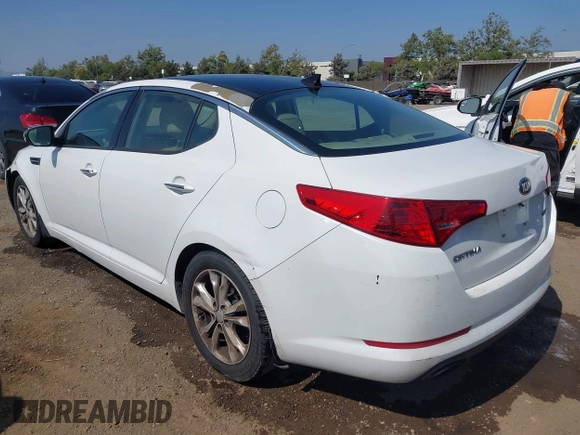2013 Kia Optima EX with VIN 5XXGN4A74DG258769, listed as a IAAI auction lot 42598047 with 165,605 mi miles and . Bid and sale history available at DreamBid. Image 3.