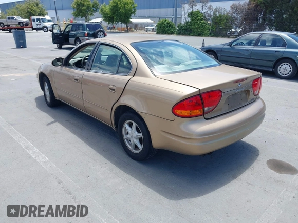 1999 Oldsmobile Alero GL z VIN 1G3NL52T1XC384073, wystawiony jako IAAI lot #42359330 z przebiegiem 177 869 mil mil oraz . Historia ofert i sprzedaży dostępna na DreamBid. Obrazek 3.