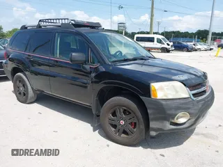 2007 Mitsubishi Endeavor LS with VIN 4A4MM21S37E055663, listed as a IAAI auction lot 39527658 with 153,346 mi miles. Bid and sale history available at carsss.com. Image 1.