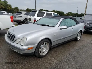 1999 Mercedes-Benz CLK 320/430 with VIN WDBLK65GXXT023566, listed as a Copart auction lot 73857834 with Not Provided miles and Salvage Title. Bid and sale history available at DreamBid. Image 1.